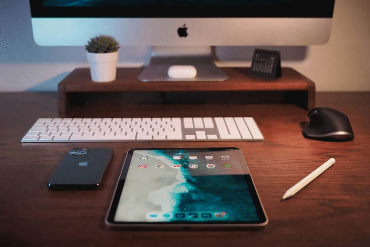 Does your desk look like this? Then we have some great news for you. (Image Source: Sirisvisual on Unsplash.com)